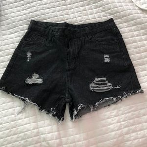 black distressed shorts